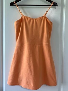 alo yoga orange dress Alo Yoga Alosoft Courtside Tennis Dress - Red Hot Summer